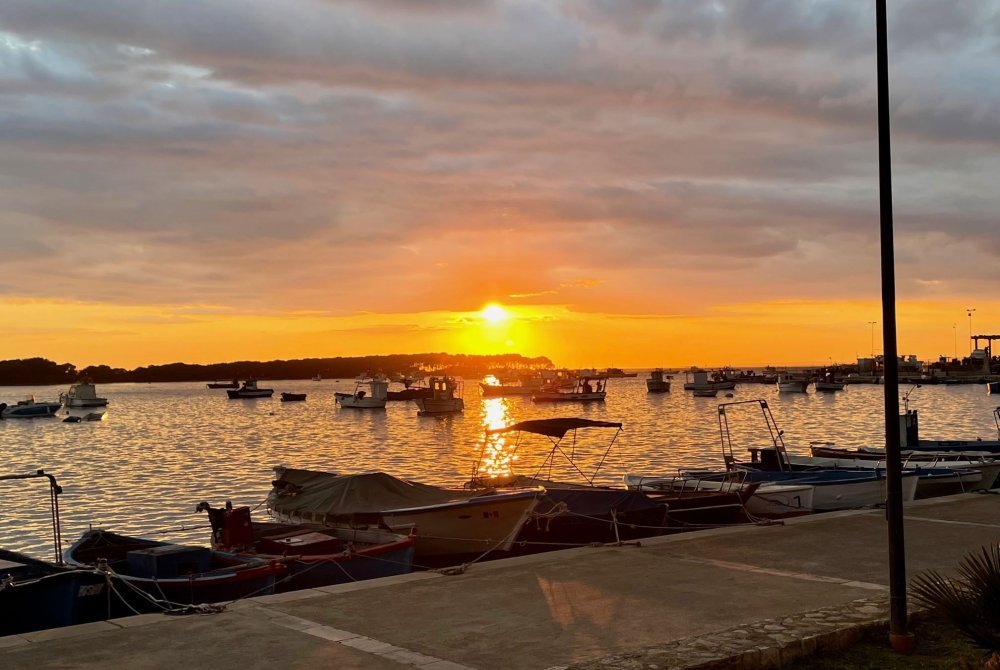 porto cesareo - ondergaande zon - zee